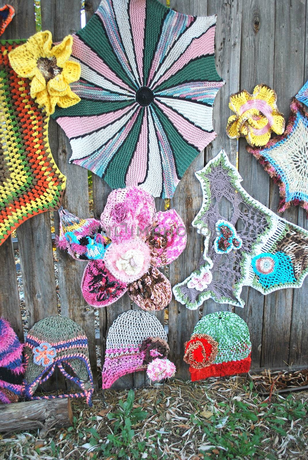 Crochet patterns displayed outdoors.
