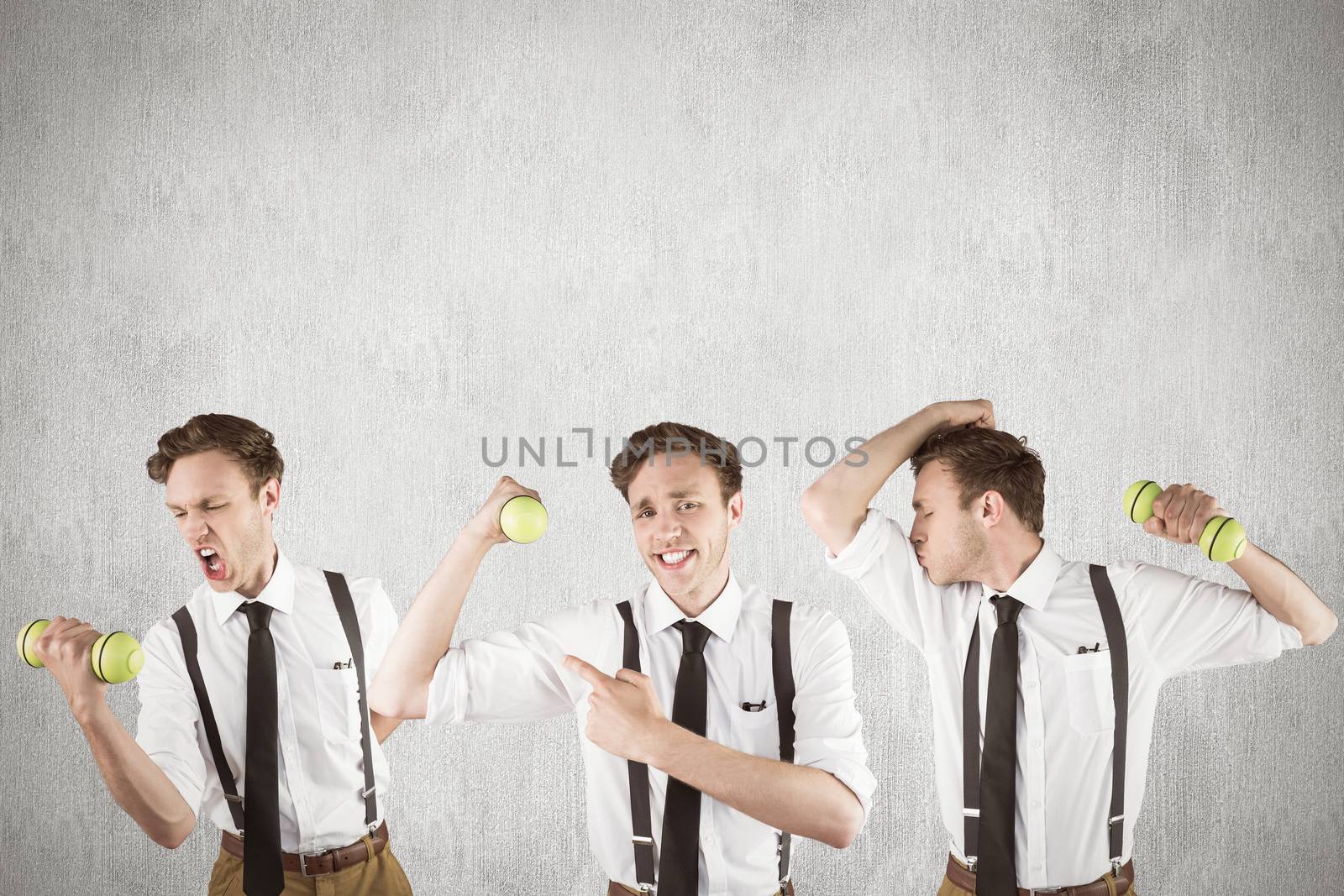 Nerd with dumbbell against white and grey background