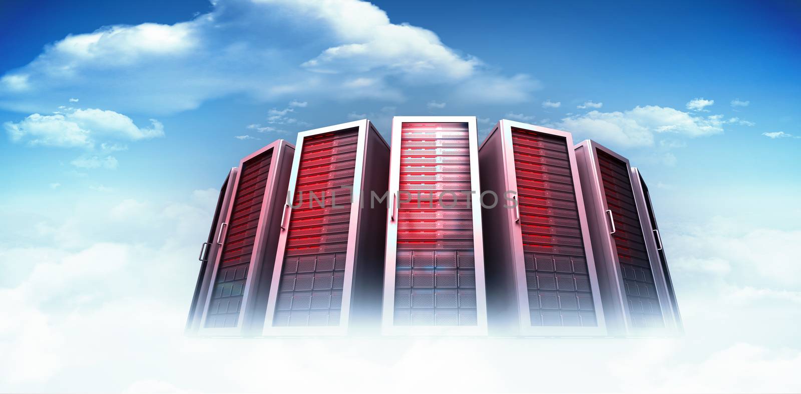 Server towers against bright blue sky with clouds