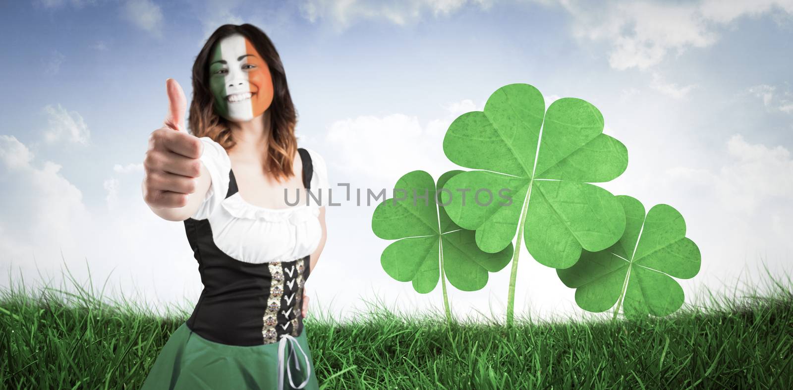 Composite image of irish girl showing thumbs up by Wavebreakmedia