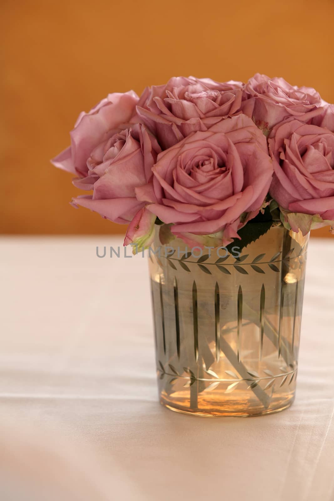 Bouquet of rose flowers in glass vase