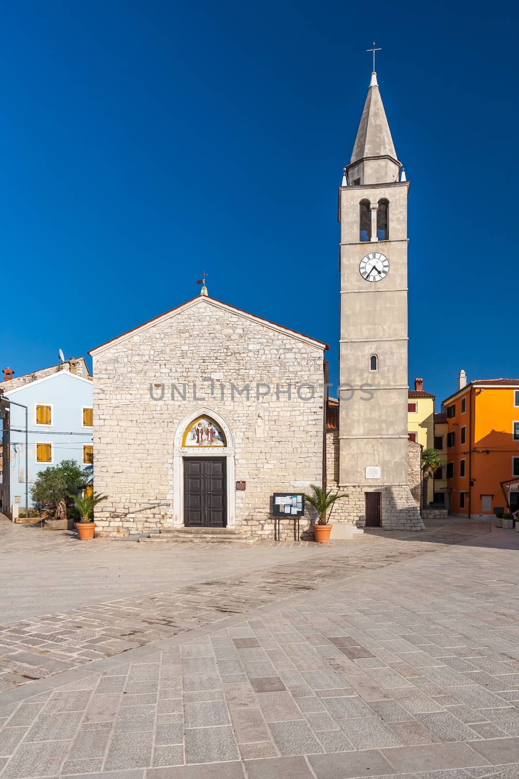 Waterfront square in Fazana. The old church