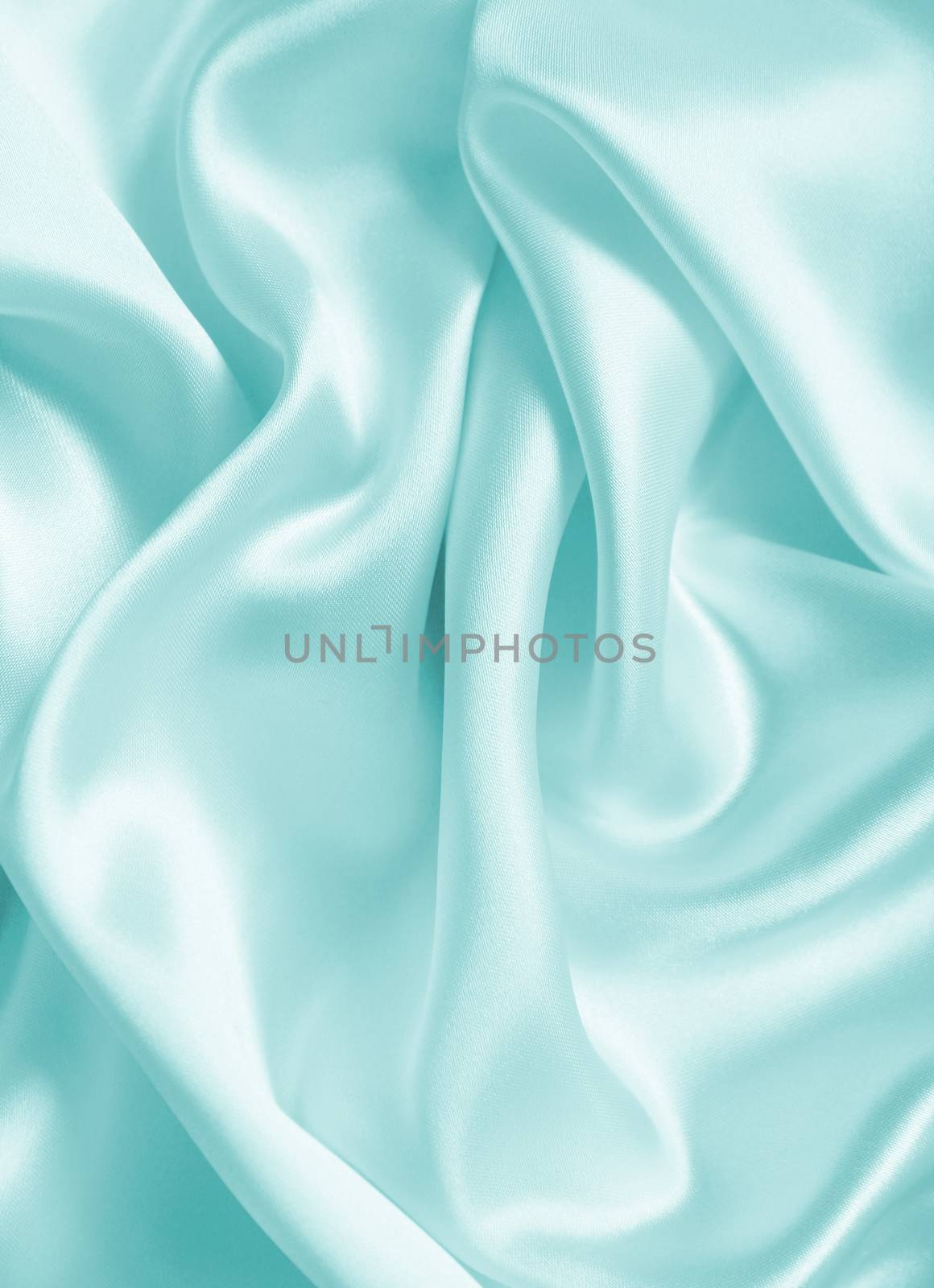 Smooth elegant blue silk or satin texture can use as background