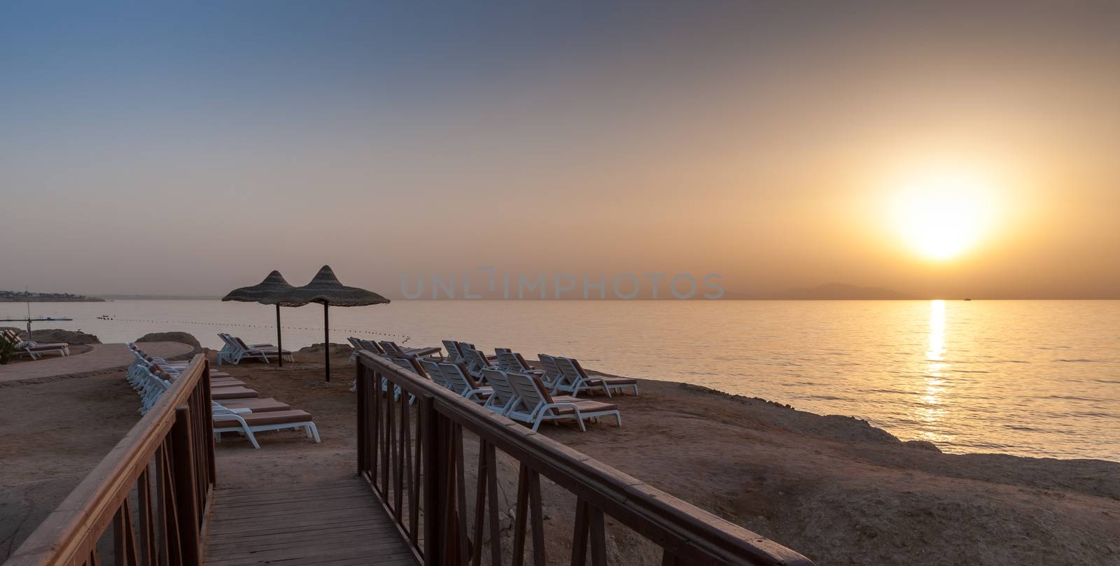 The sunset on the beach of Red Sea in Egypt . Charm an ale the Sheikh