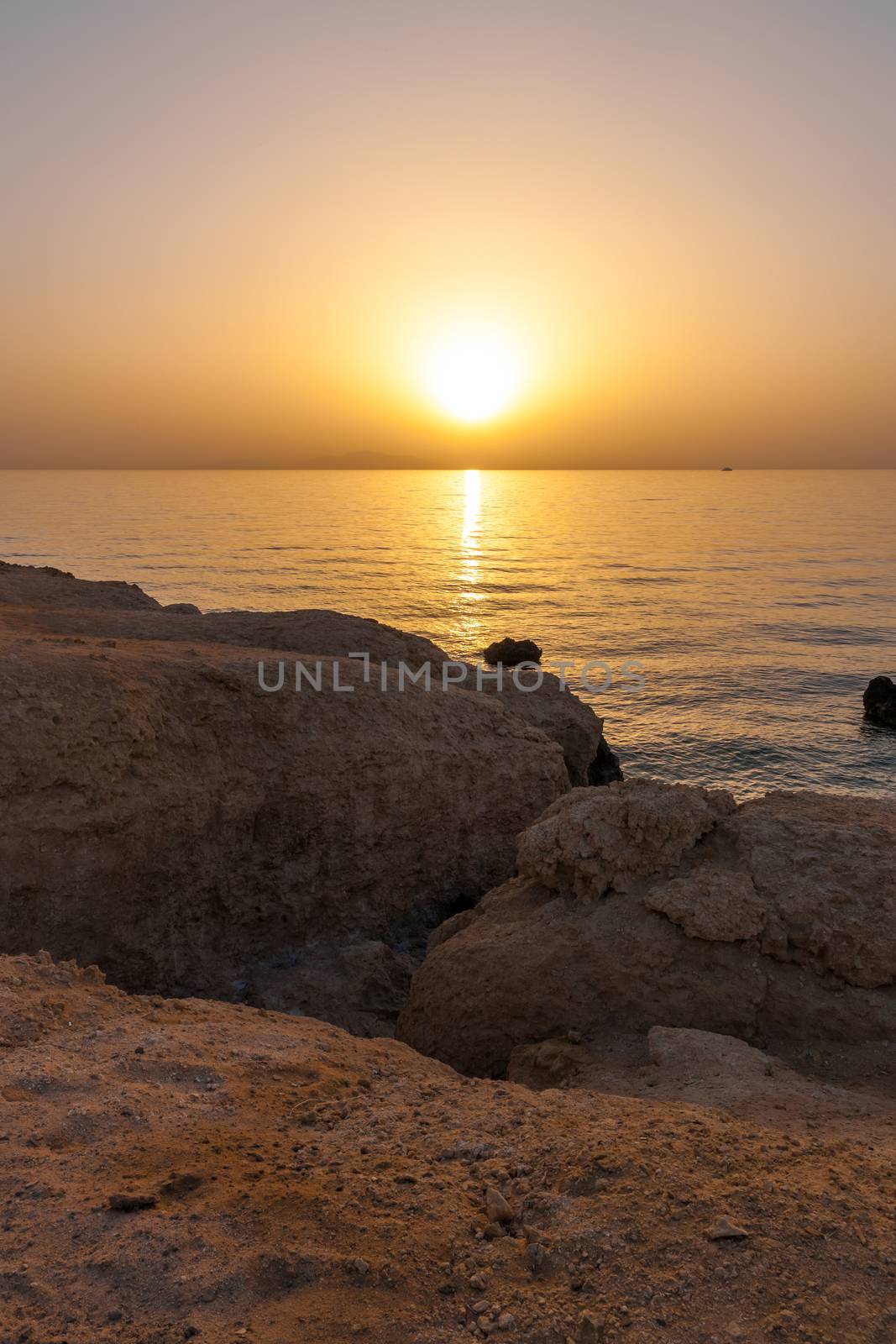 The sunset on the beach of Red Sea in Egypt . Charm an ale the Sheikh