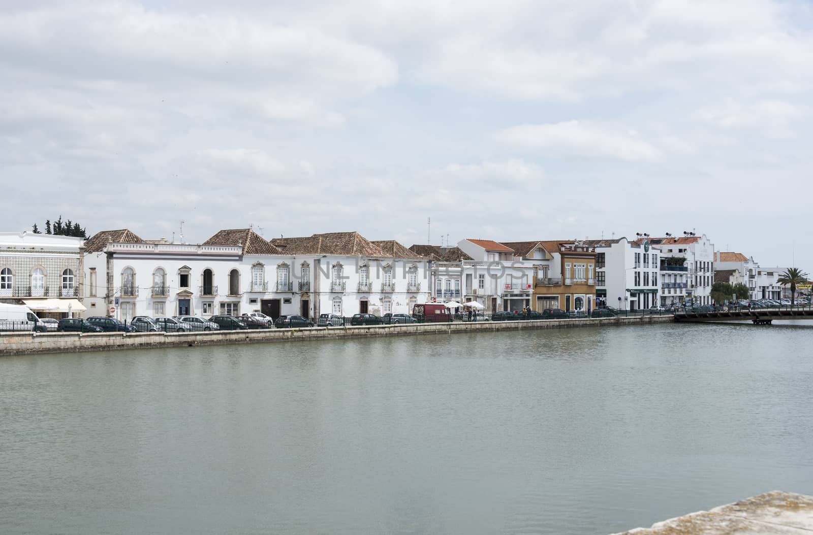 TAVIRA,PORTUGAL-APRIL17, 2015: view on the old houses and bridge of the old town Tavira in the south of Portugal on April 17 2015,This town is one of the oldest towns in Portugal in the Algarve