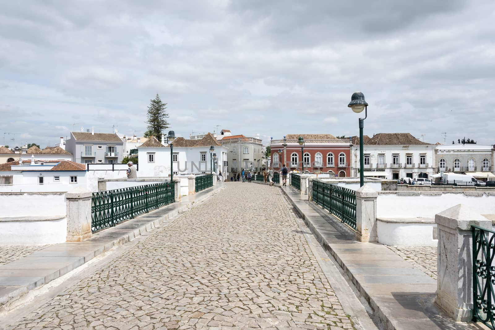 TAVIRA,PORTUGAL-APRIL17, 2015: view on the old houses and bridge of the old town Tavira in the south of Portugal on April 17 2015,This town is one of the oldest towns in Portugal in the Algarve