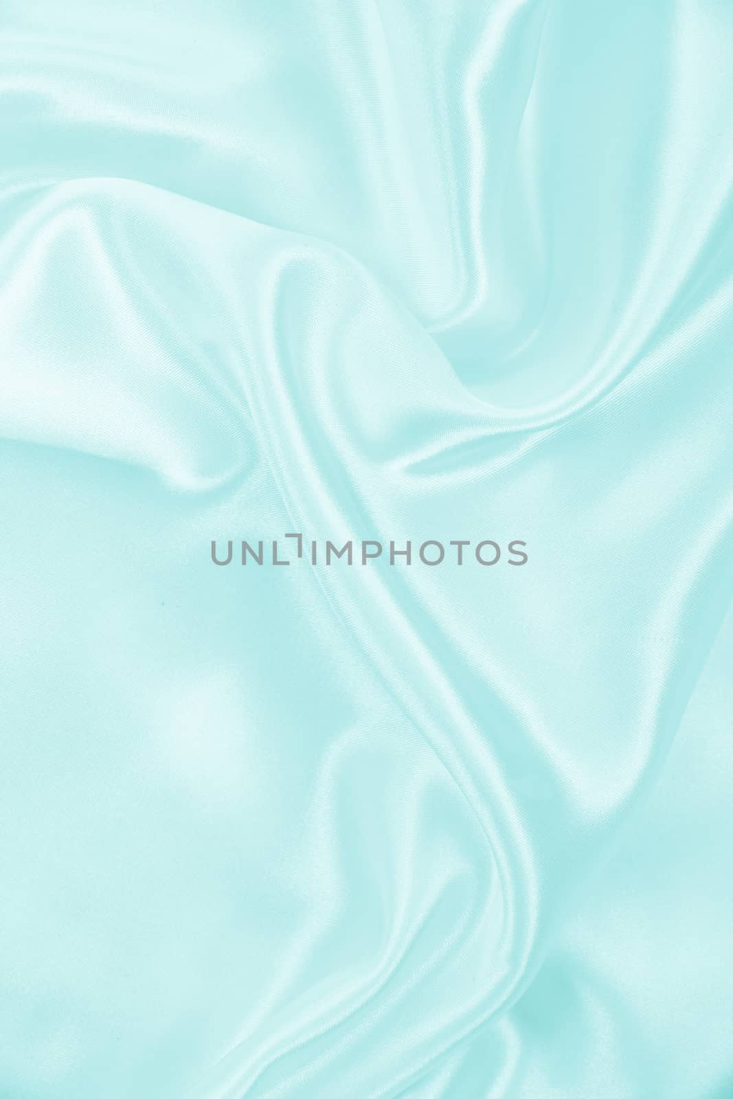 Smooth elegant blue silk or satin texture as background  by oxanatravel