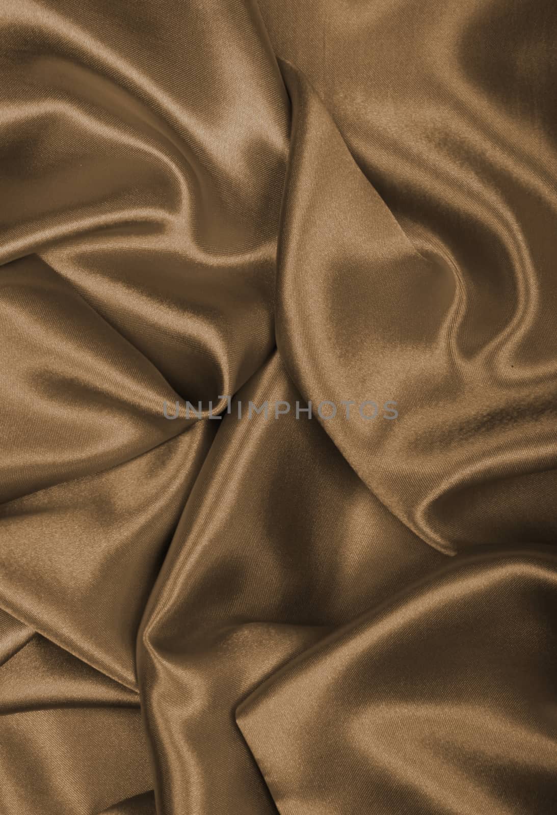 Smooth elegant golden silk or satin can use as background. In Sepia toned. Retro style