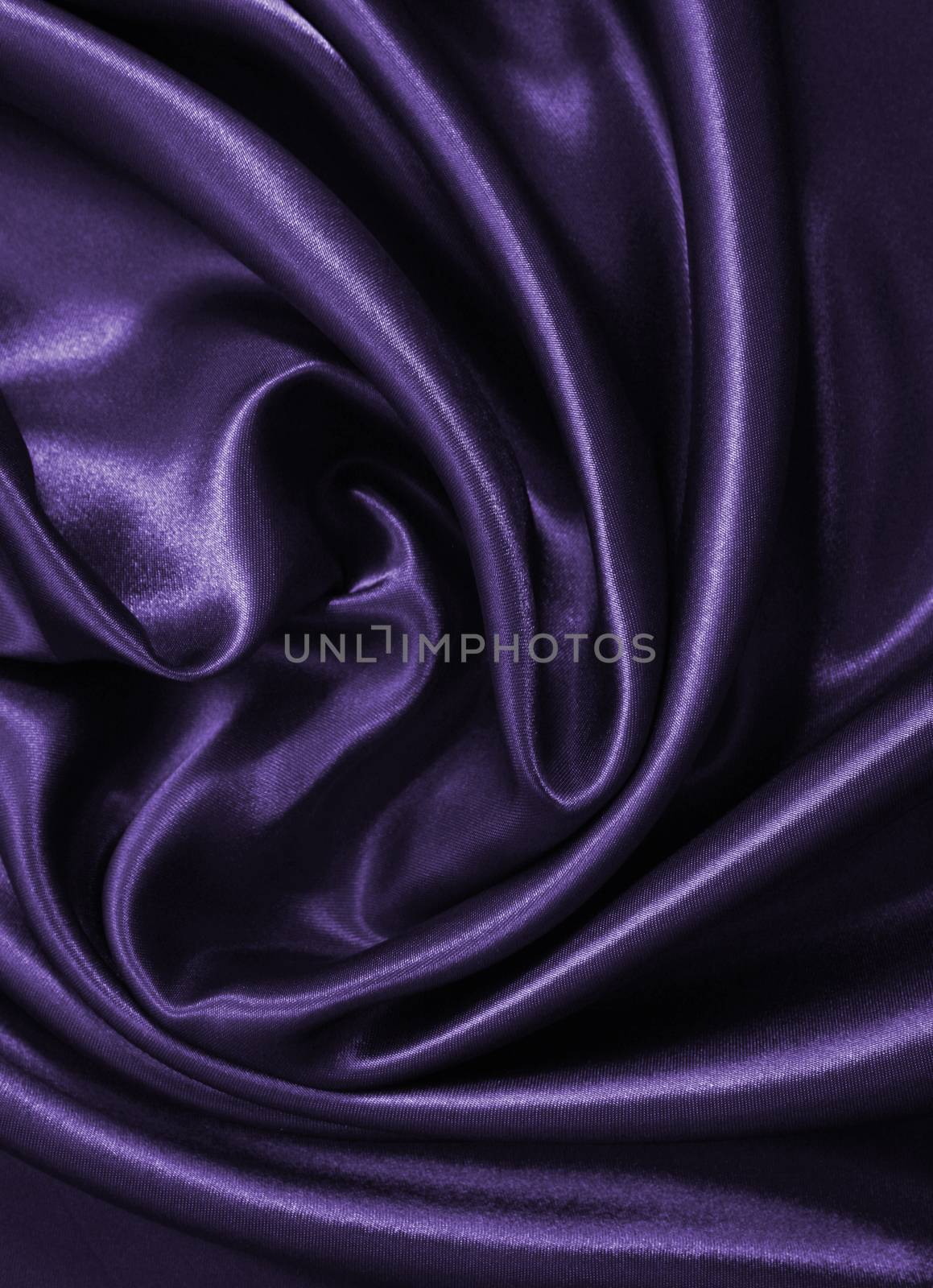 Smooth elegant lilac silk or satin as background 