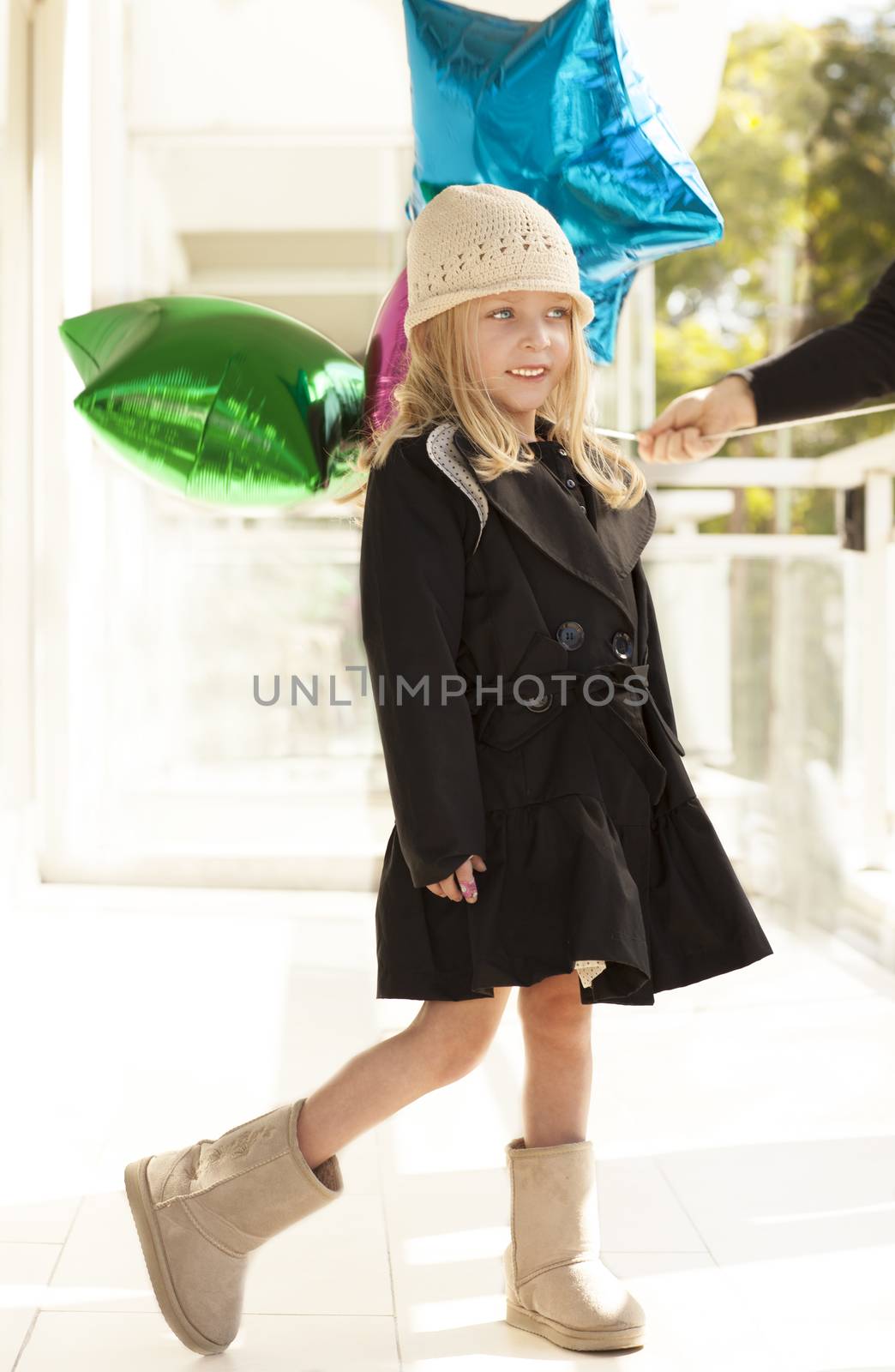 Cute girl with balloons by veronicagomezpola