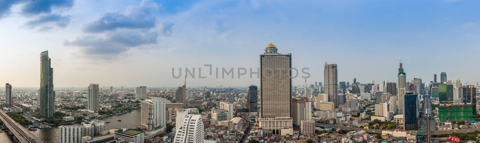 Business Building Bangkok city area at day time with transportation car and ship as panorama, high angle bird eyes view
