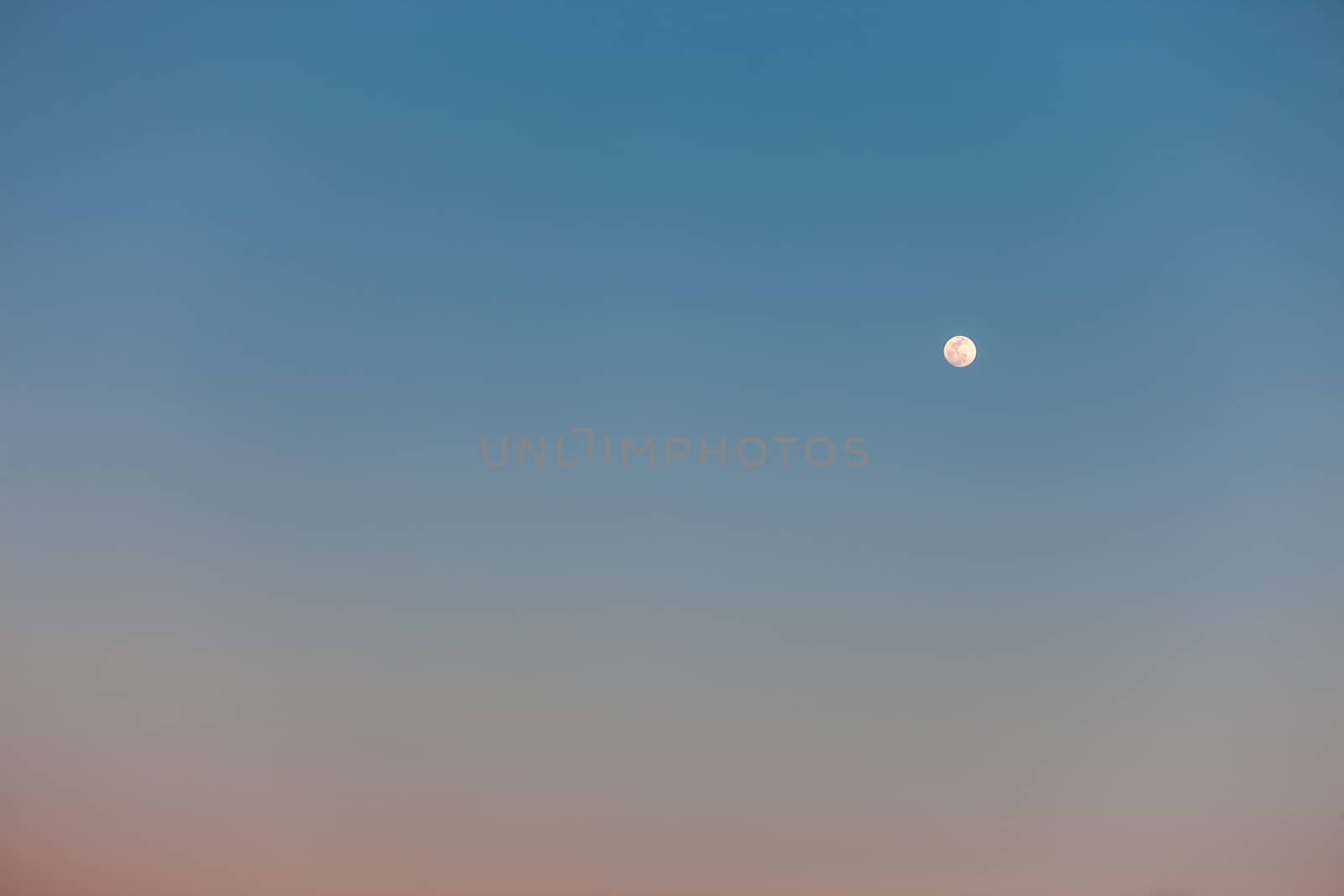  The Full Moon in daylight blue sky