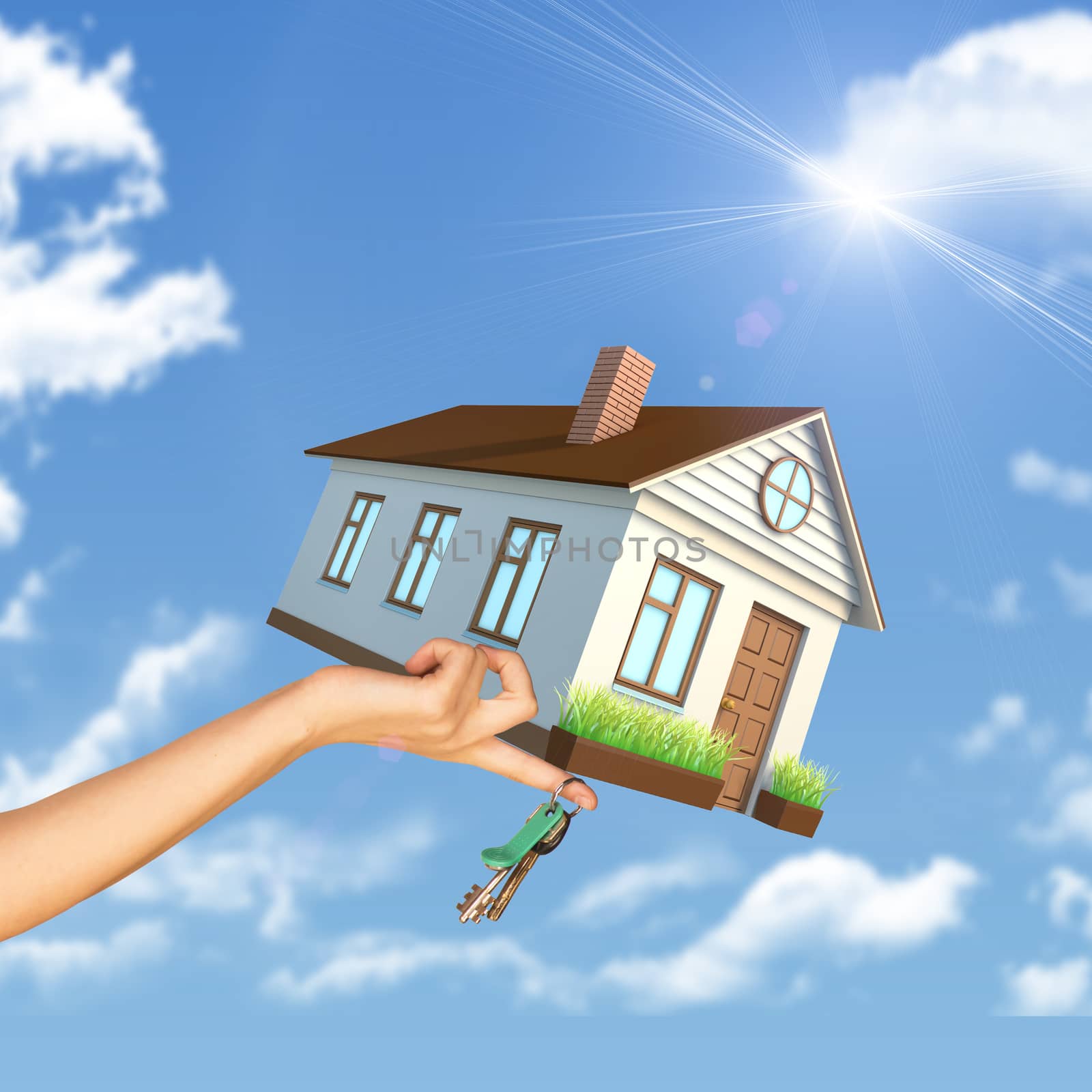 House and keys in right womans hand on blue sky background 