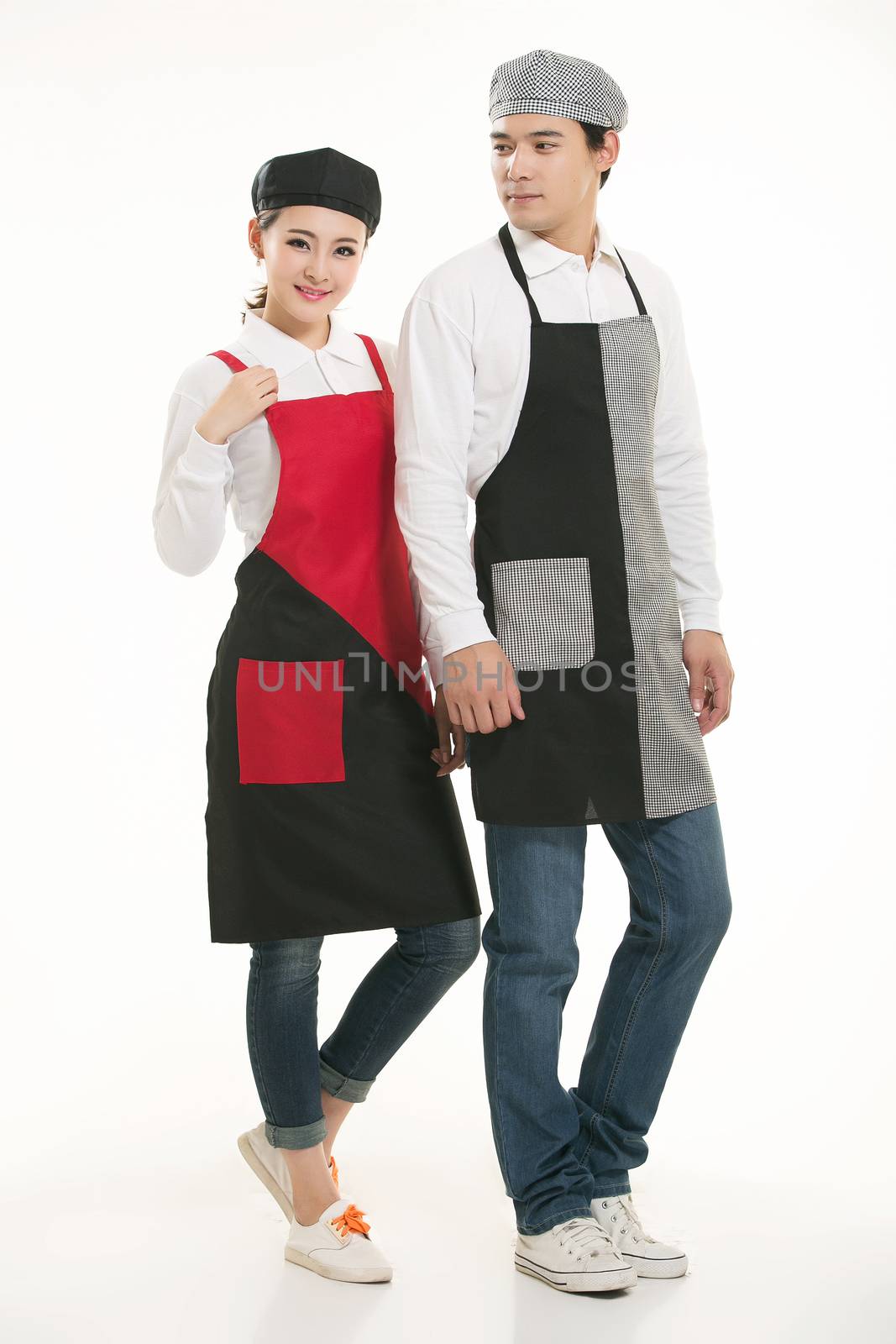 Wear all kinds of T-shirts waiter standing in white background by quweichang