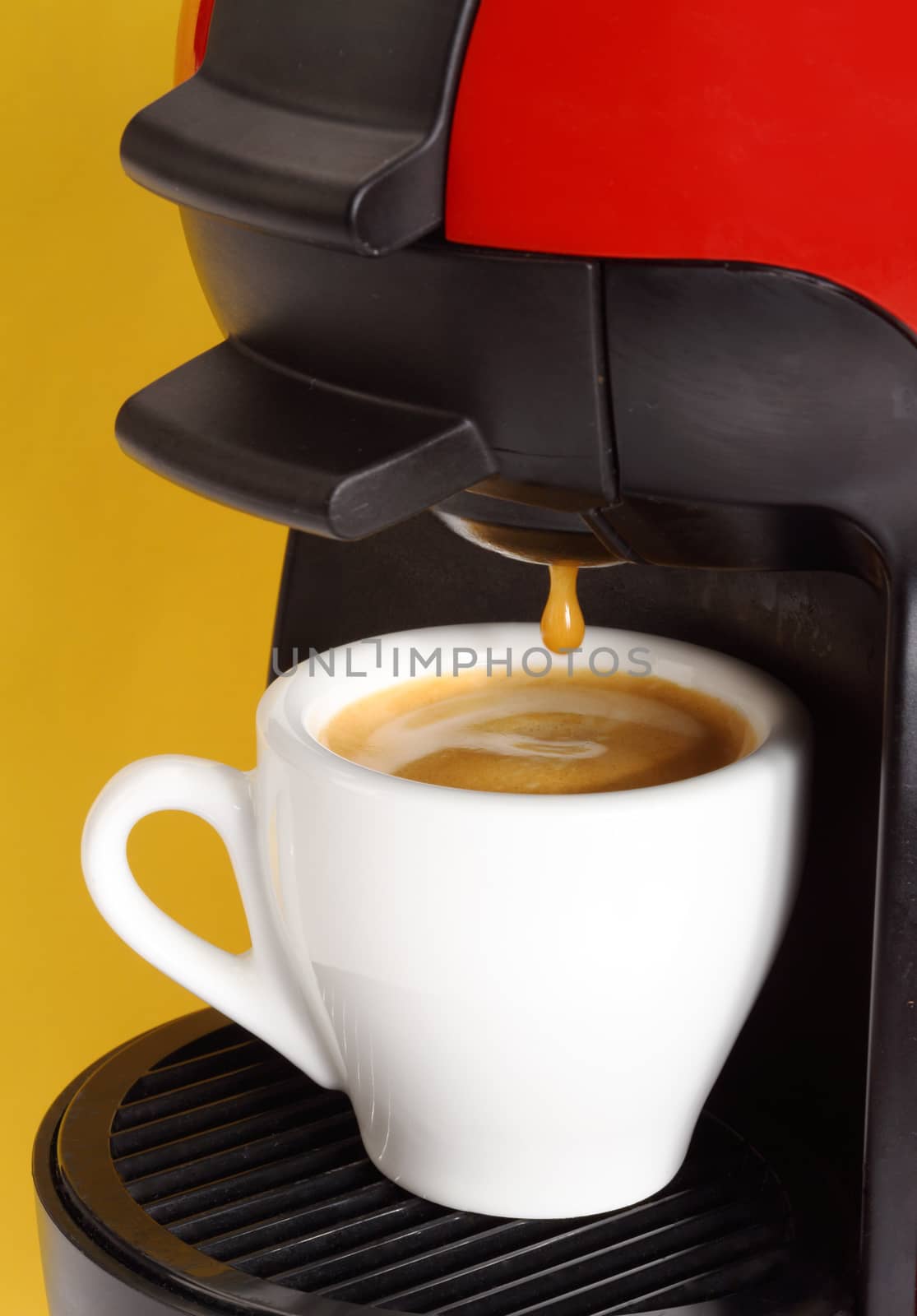 Espresso coffee maker in actionclose up shallow dof