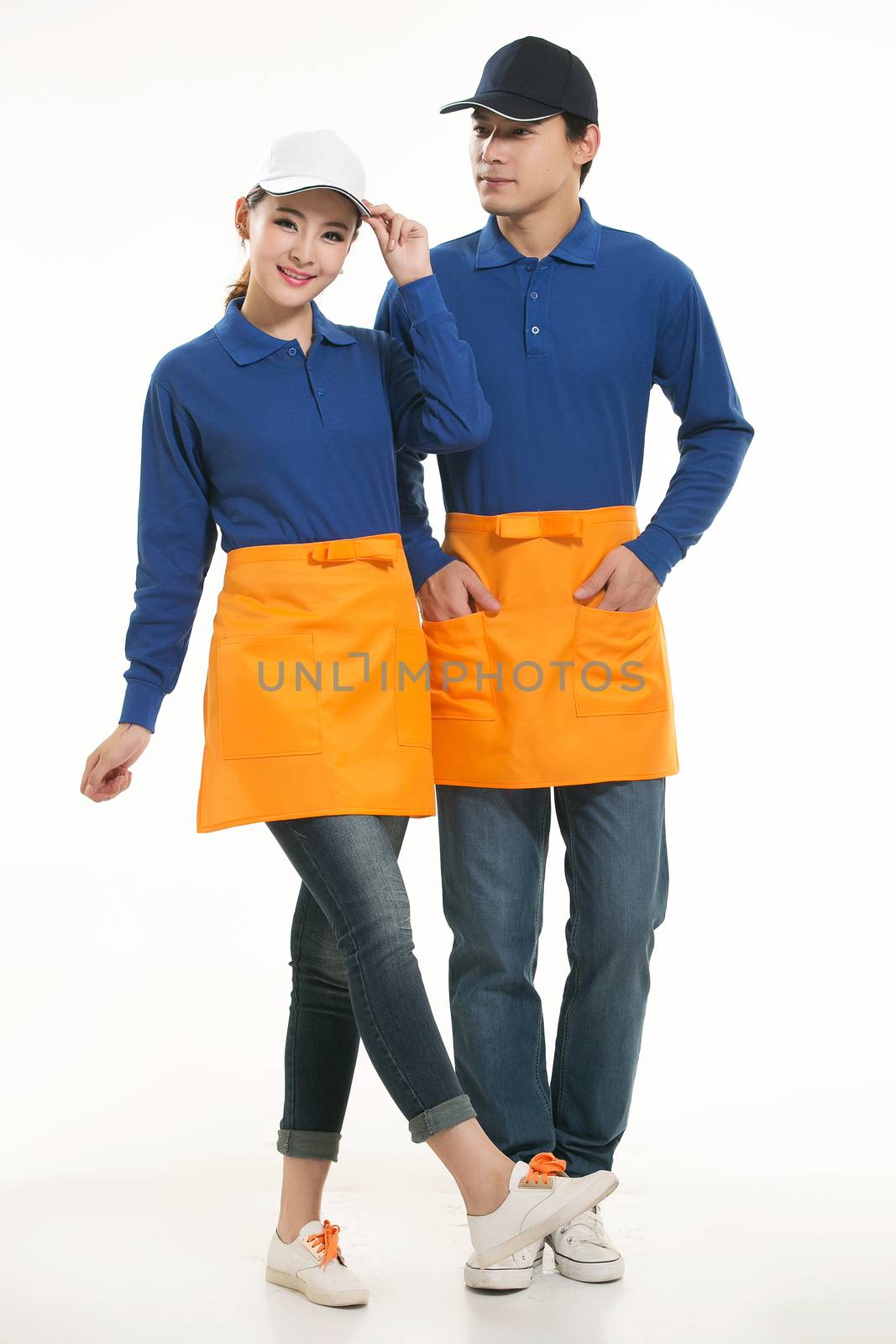 Wear all kinds of T-shirts waiter standing in white background by quweichang