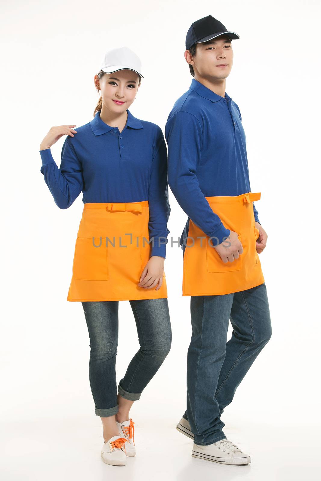 Wear all kinds of T-shirts waiter standing in white background by quweichang