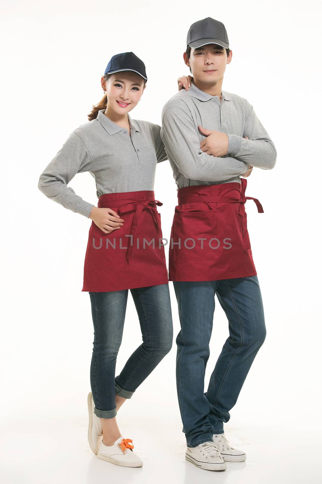 Wear all kinds of T-shirts waiter standing in white background by quweichang