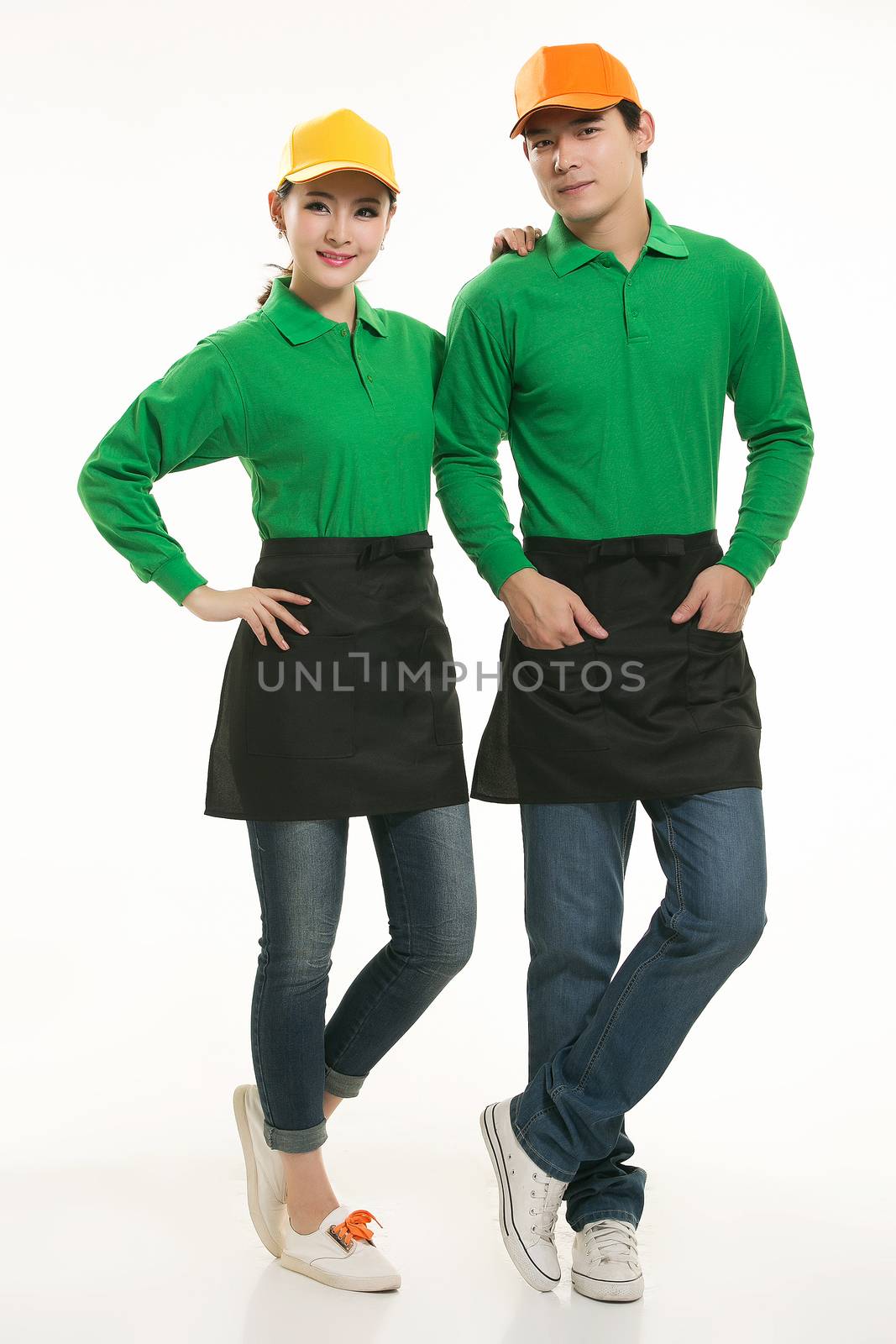 Wear all kinds of T-shirts waiter standing in white background by quweichang