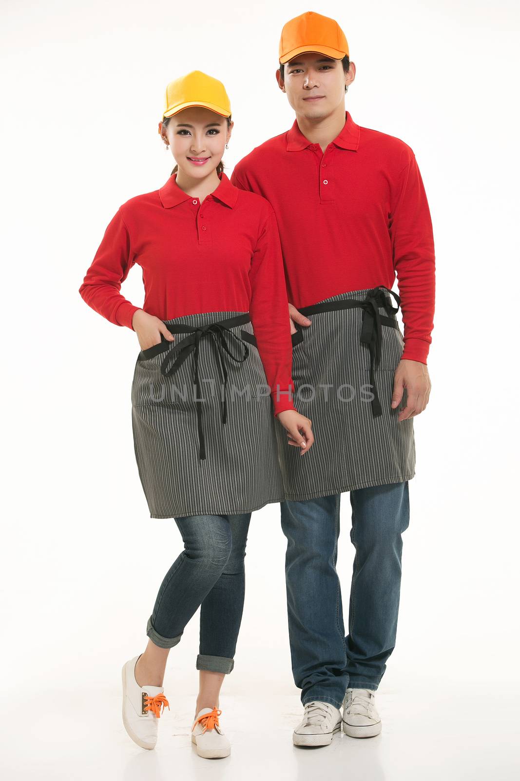 Wear all kinds of T-shirts waiter standing in white background by quweichang