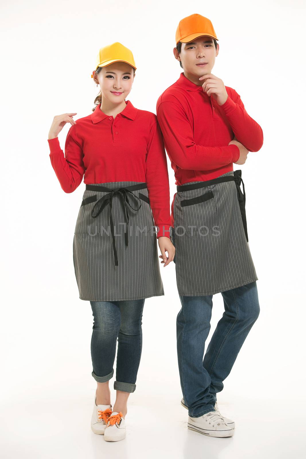 Wear all kinds of T-shirts waiter standing in white background by quweichang