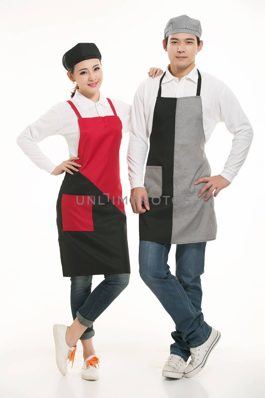 Wear all kinds of T-shirts waiter standing in white background by quweichang