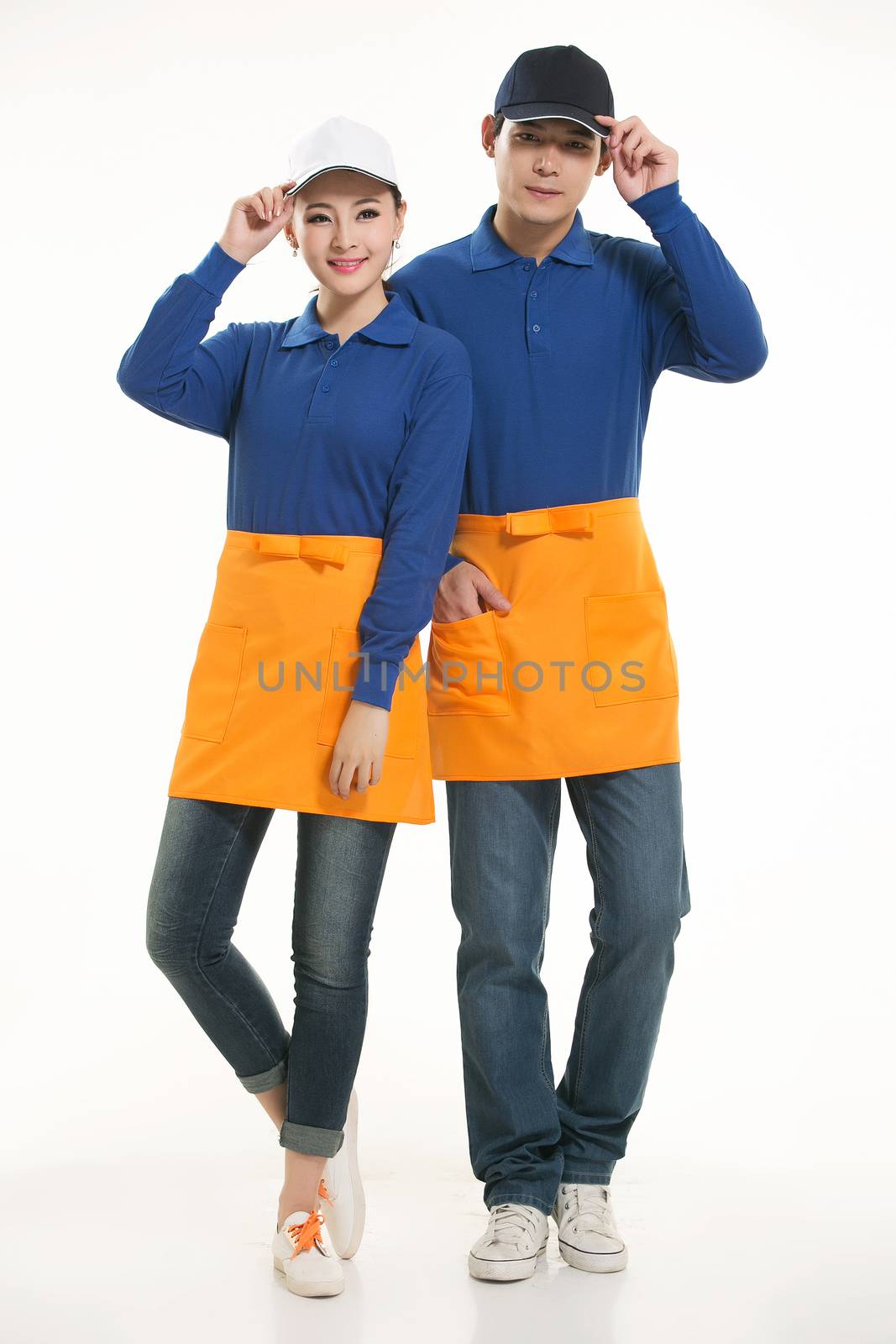 Wear all kinds of T-shirts waiter standing in white background by quweichang