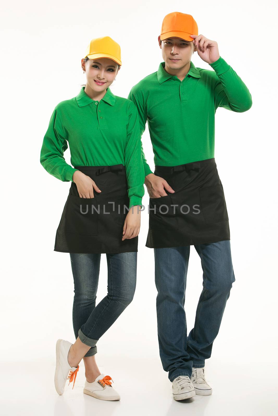 Wear all kinds of T-shirts waiter standing in white background by quweichang