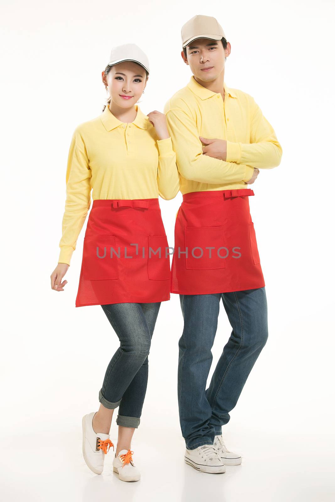 Wear all kinds of T-shirts waiter standing in white background by quweichang
