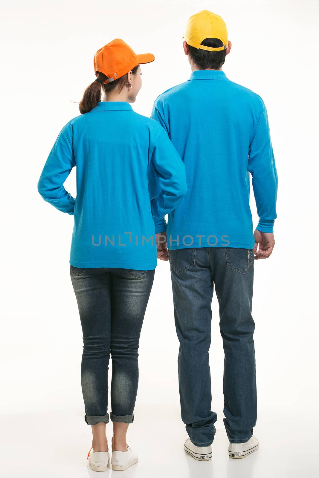 Wear all kinds of T-shirts waiter standing in white background