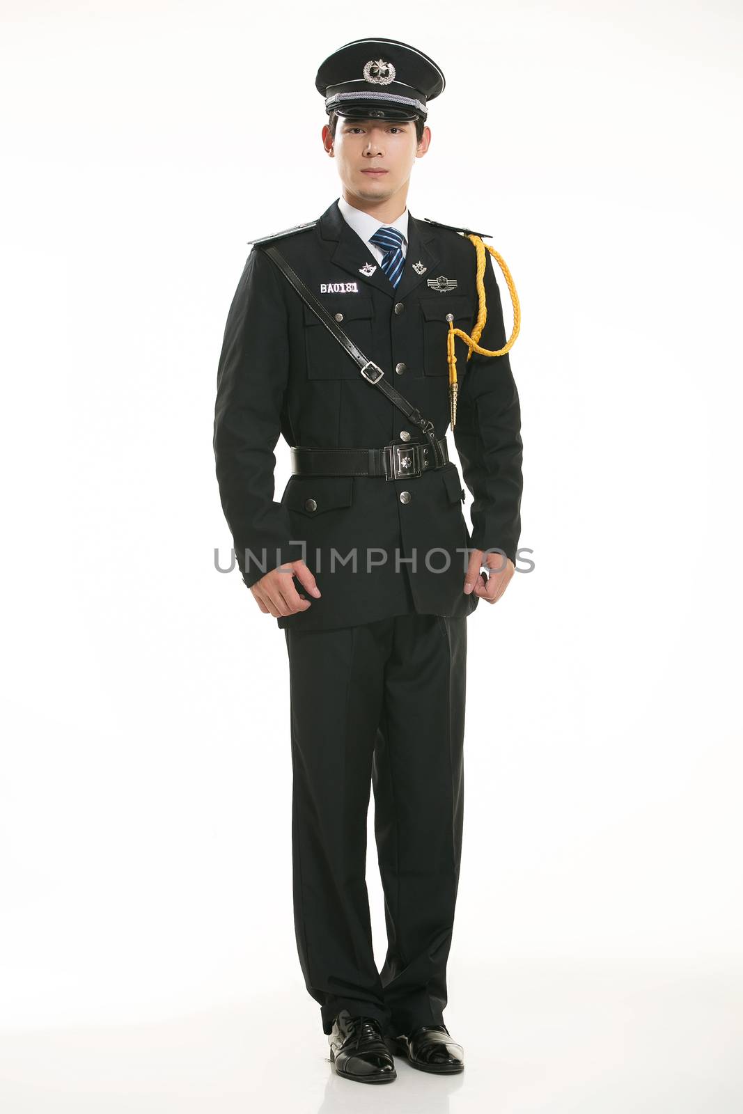 Create all kinds of work clothes policeman stands in front of a white background