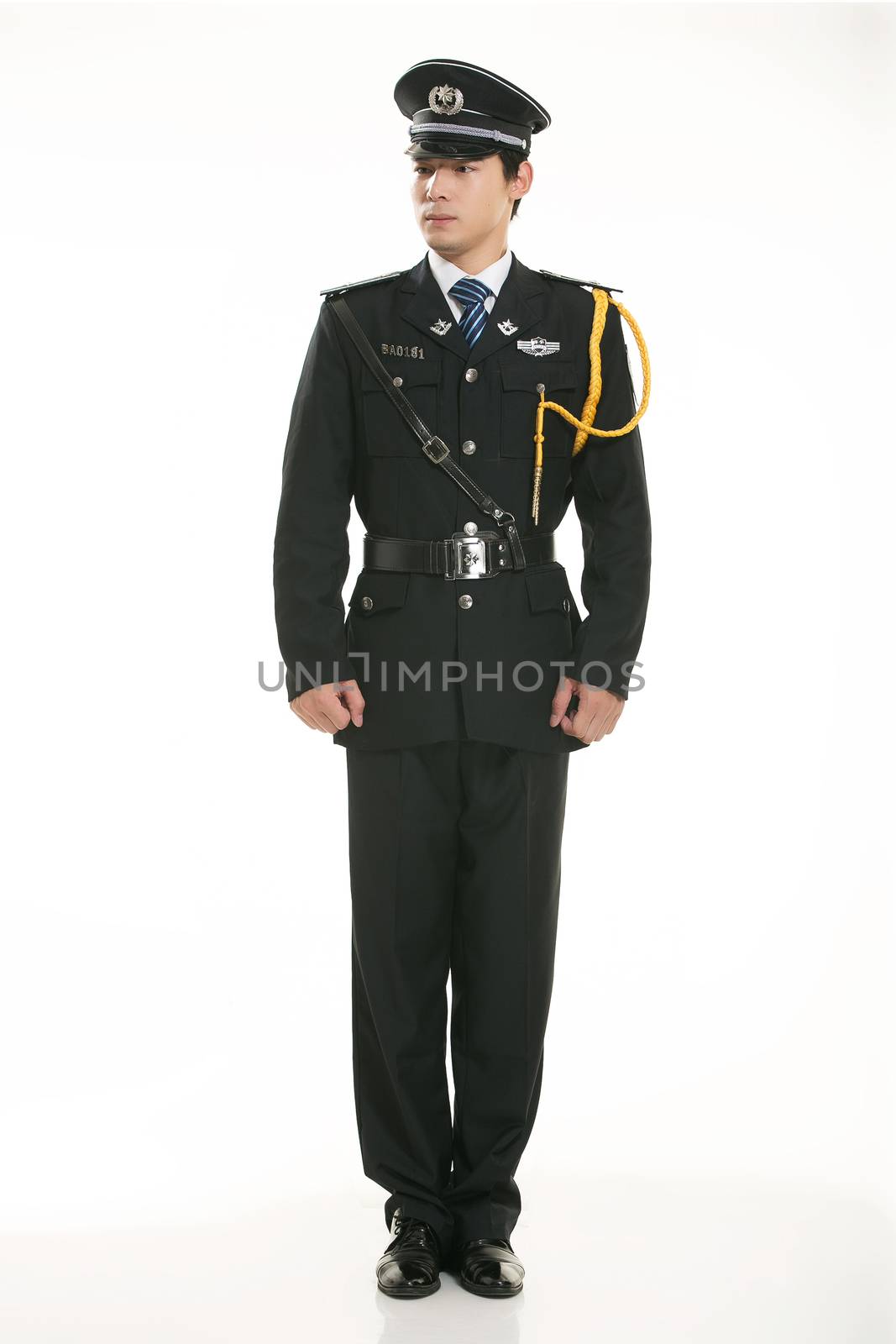 Create all kinds of work clothes policeman stands in front of a white background by quweichang