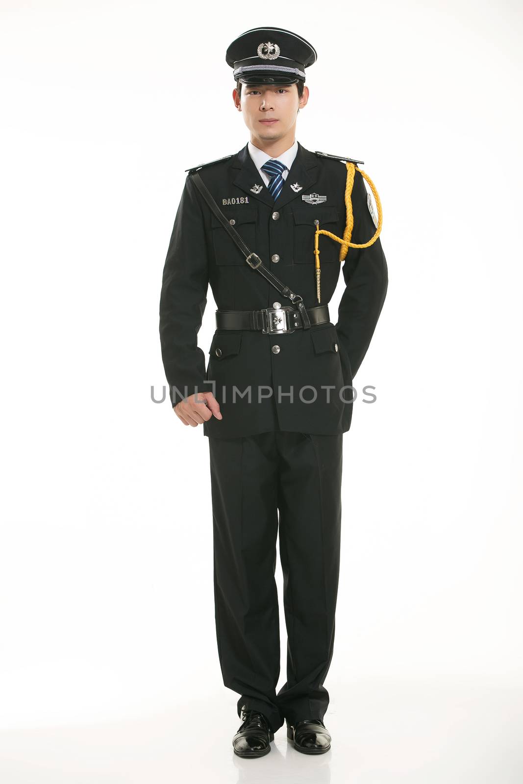 Create all kinds of work clothes policeman stands in front of a white background