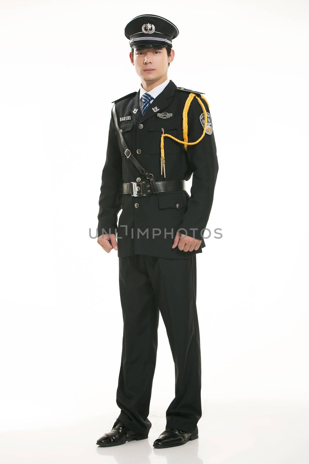 Create all kinds of work clothes policeman stands in front of a white background by quweichang