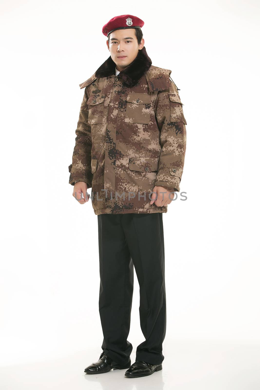 Create all kinds of work clothes policeman stands in front of a white background