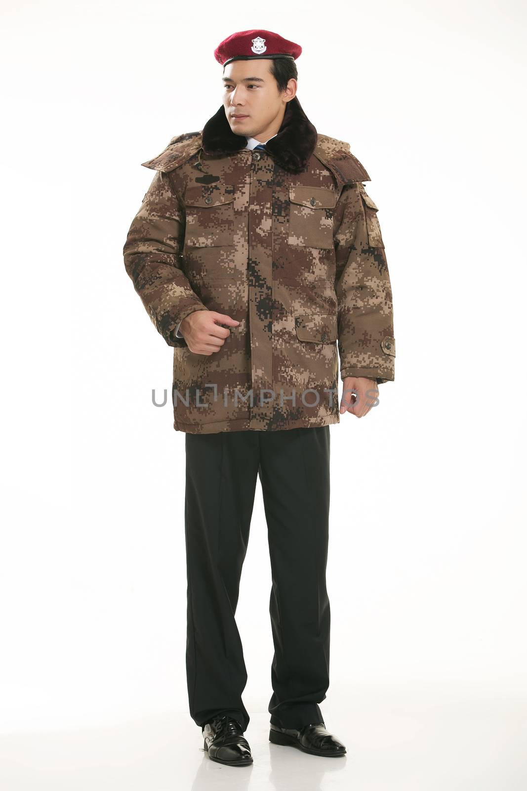 Create all kinds of work clothes policeman stands in front of a white background by quweichang