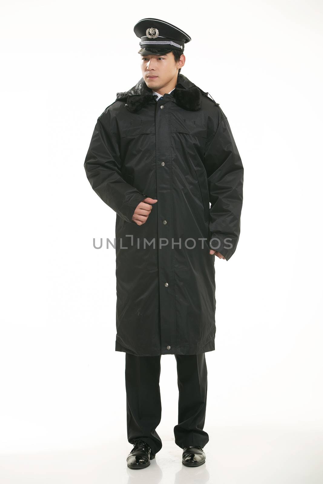 Create all kinds of work clothes policeman stands in front of a white background