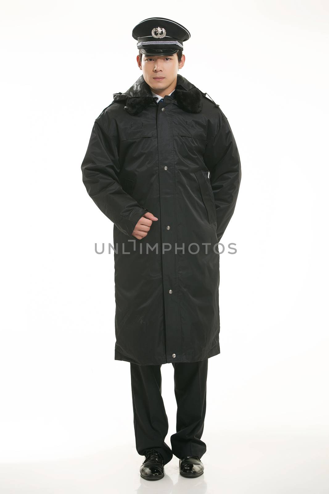 Create all kinds of work clothes policeman stands in front of a white background