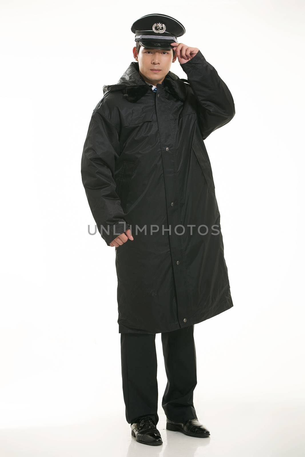 Create all kinds of work clothes policeman stands in front of a white background by quweichang