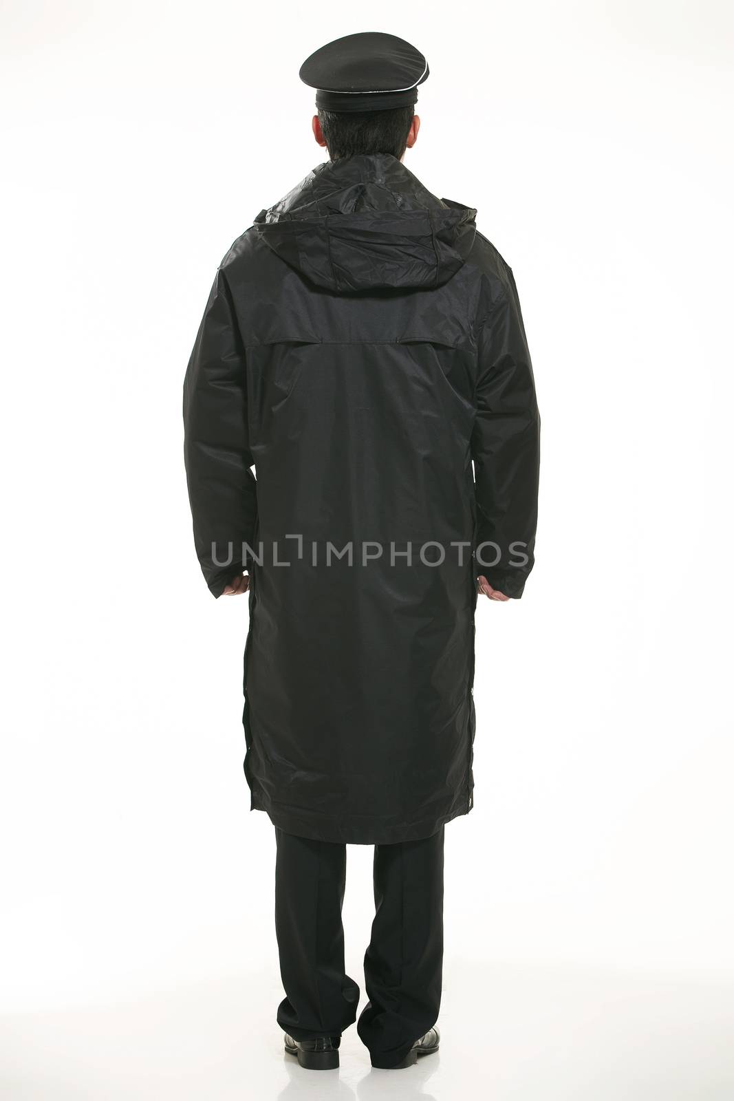 Create all kinds of work clothes policeman stands in front of a white background