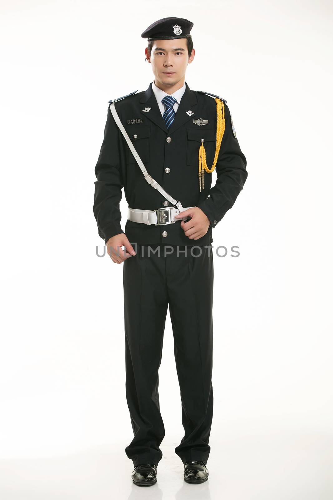 Create all kinds of work clothes policeman stands in front of a white background by quweichang