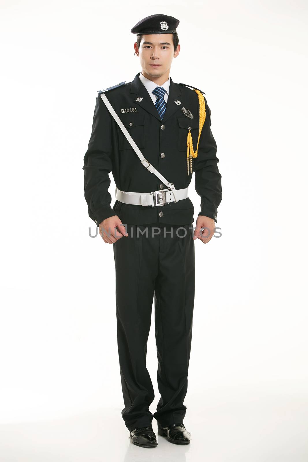 Create all kinds of work clothes policeman stands in front of a white background