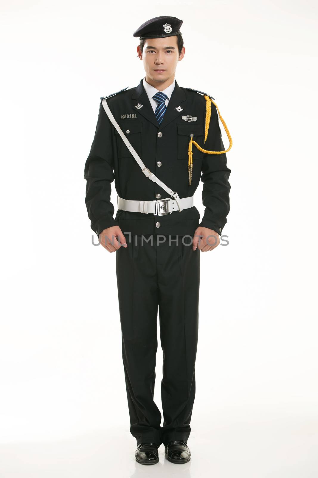 Create all kinds of work clothes policeman stands in front of a white background by quweichang