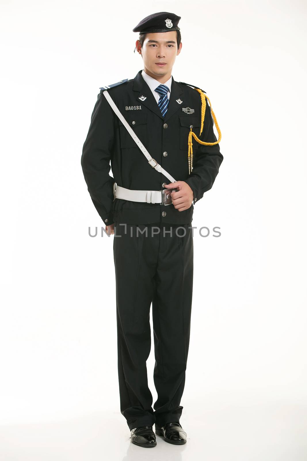 Create all kinds of work clothes policeman stands in front of a white background