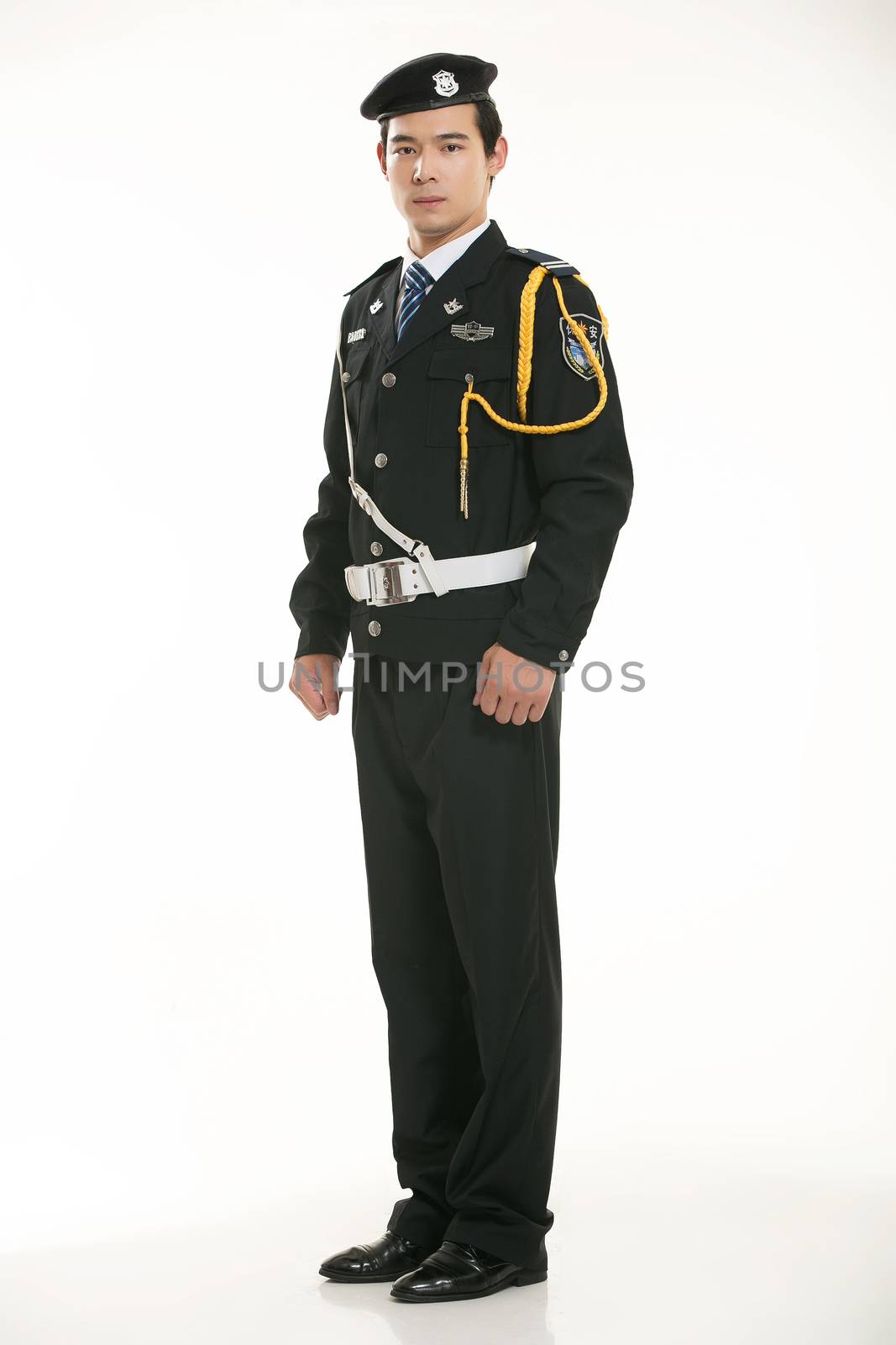 Create all kinds of work clothes policeman stands in front of a white background