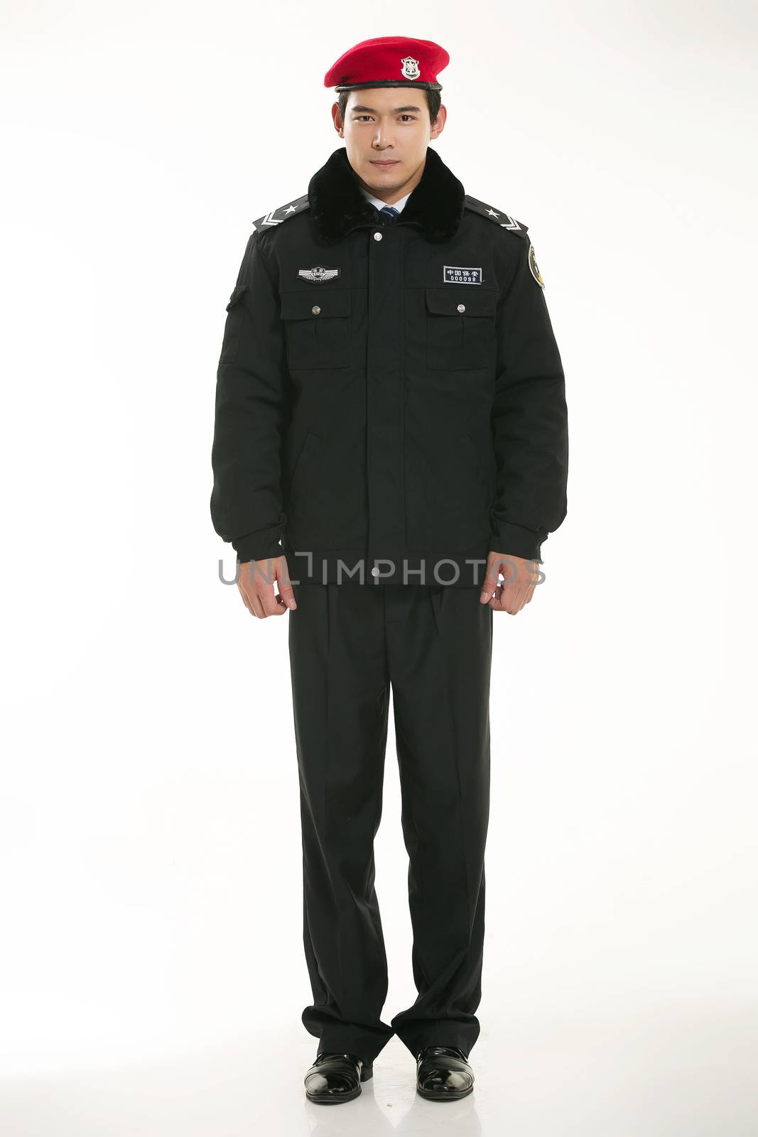 Create all kinds of work clothes policeman stands in front of a white background by quweichang