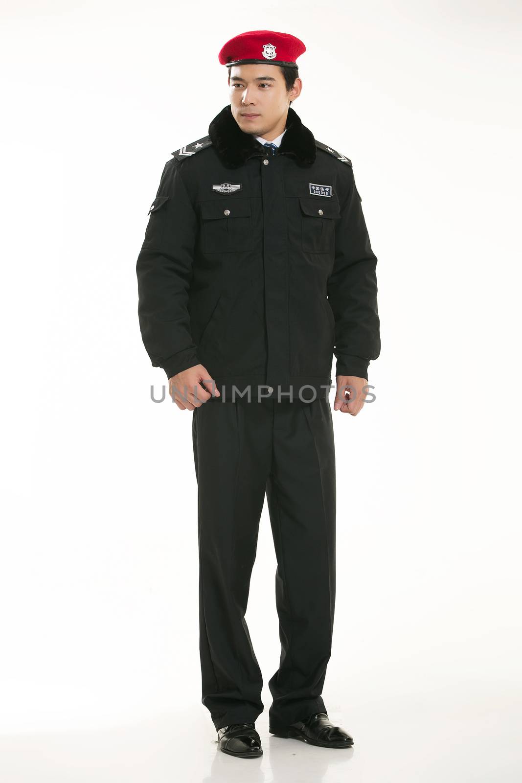 Create all kinds of work clothes policeman stands in front of a white background by quweichang