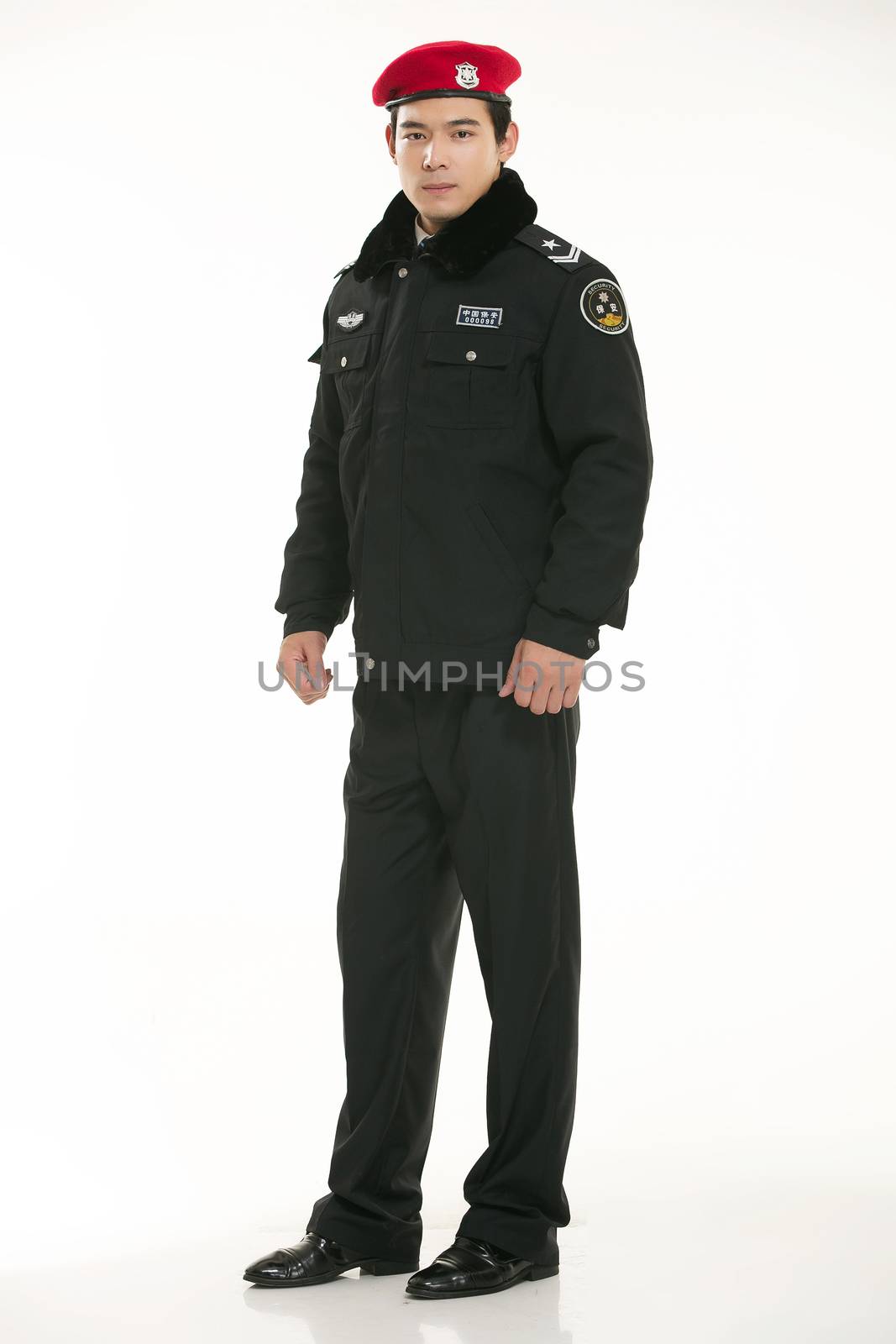 Create all kinds of work clothes policeman stands in front of a white background by quweichang