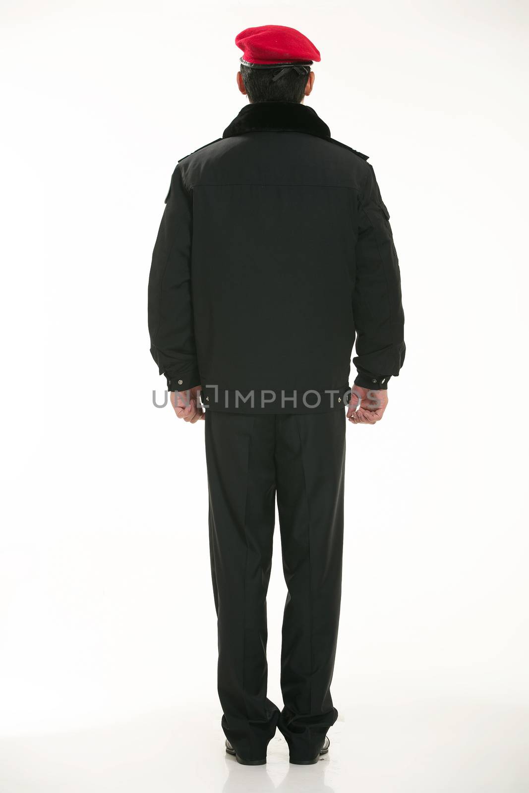 Create all kinds of work clothes policeman stands in front of a white background by quweichang